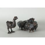A lot consisting of bronze sheep and a duck.