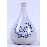 A so-called earthenware V.O.C bottle. Japan, 20th century.
