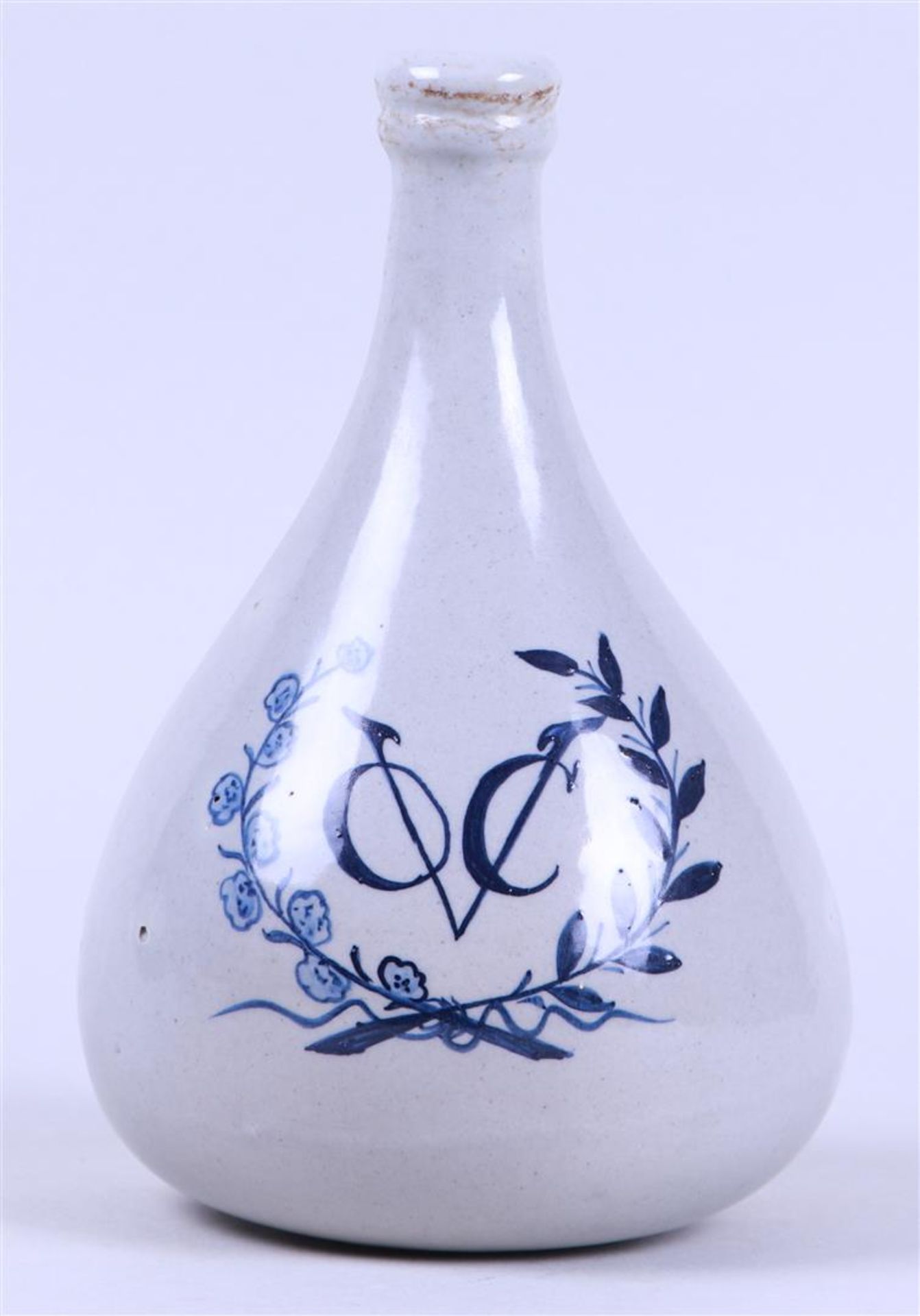 A so-called earthenware V.O.C bottle. Japan, 20th century.
