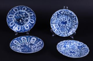 Two sets of two plates with floral and crab and perch decor. China, Kangxi.