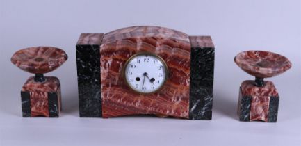 A red marble clock set. France, 19th century.