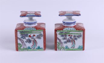 A set of two rectangular porcelain tea caddies, with character characters on the stoppers. Japan, 19