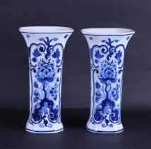 A set of two earthenware beaker vases, marked: "De Porceleyne Fles".
