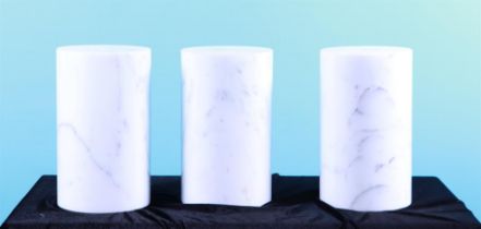 A lot consisting of (3) white marble pedestals, possibly stackable.
