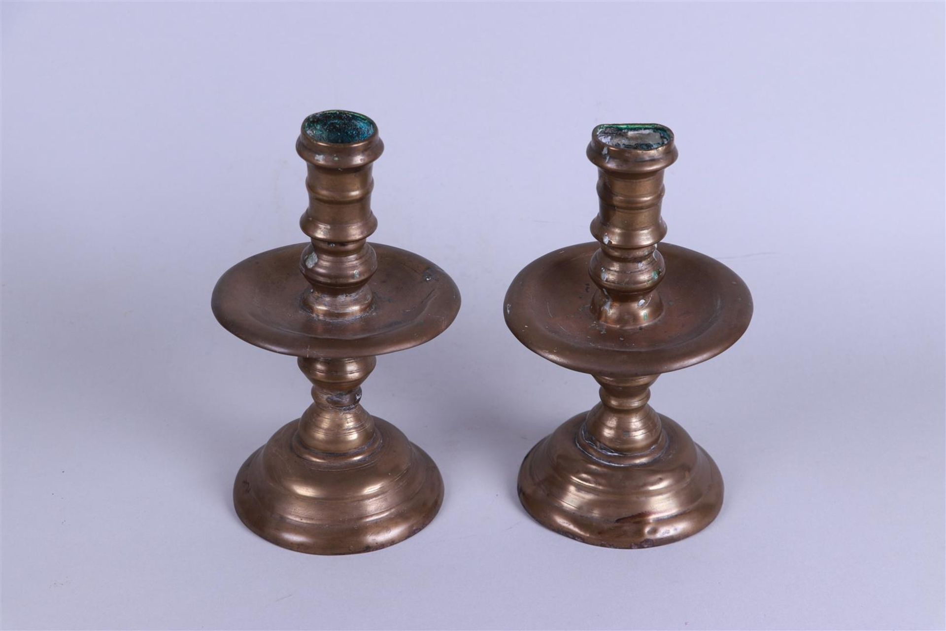 A set of large disc candlesticks. 19th century.
