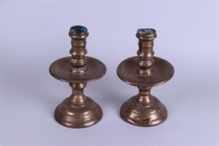 A set of large disc candlesticks. 19th century.