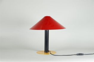 A lacquered metal table lamp.