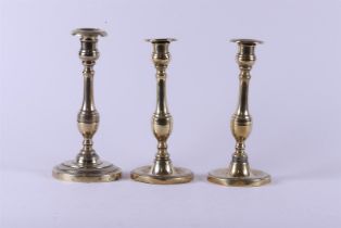 A lot consisting of (3) candlesticks, 19th century.