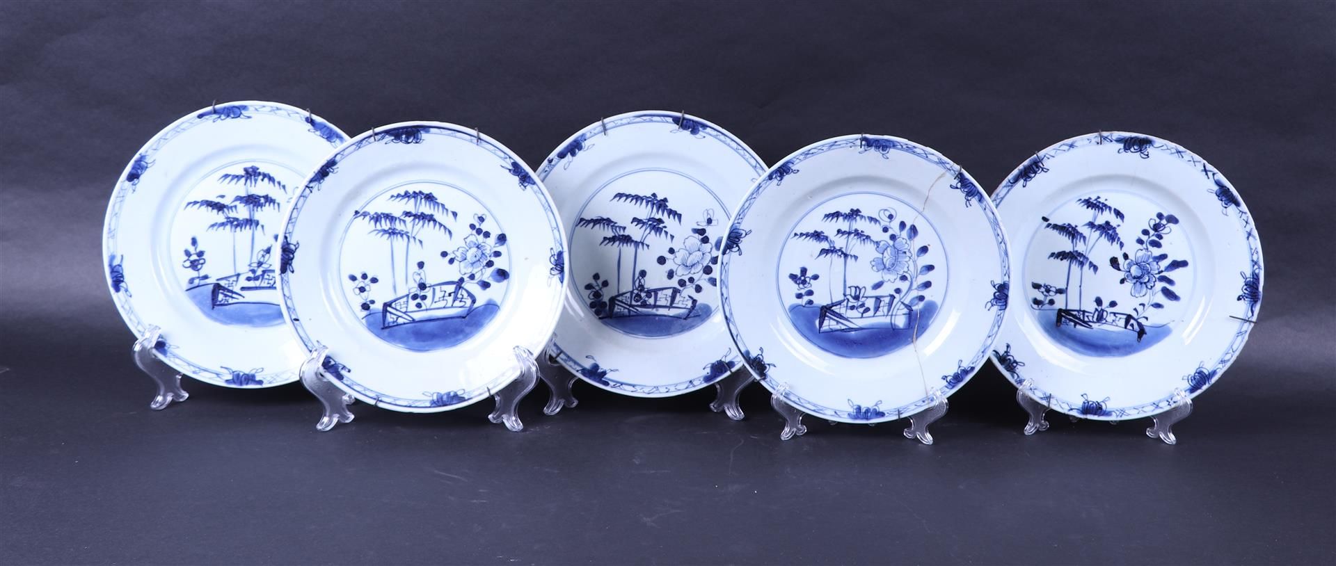 A set of five proscelain plates with landscape decor. China, 18th century.
