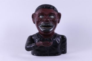 A cast iron "Jolly" mechanical money box,