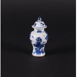 A porcelain baluster-shaped lidded vase with a rich floral decoration with insects in between. China