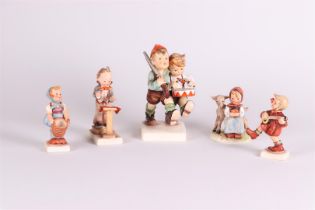 MI. Hummel, a lot with (5) figurines, all marked Goebel.