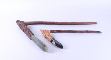 Two adzes/axes, one with jade blade and the other with basalt blade, Papua New Guinea.
