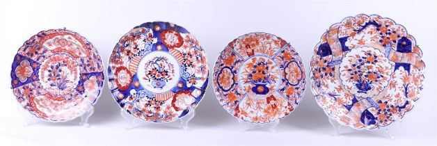A lot of four Imari wall plates with various decors. Japan, 19th century.
