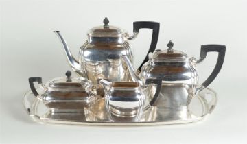 A five-piece coffee and tea set, consisting of a tray, a coffee pot and teapot, a sugar bowl