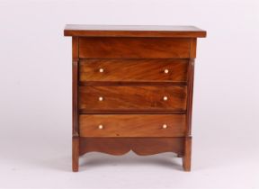 A mahogany glued master of a chest of drawers. Holland, circa 1830.