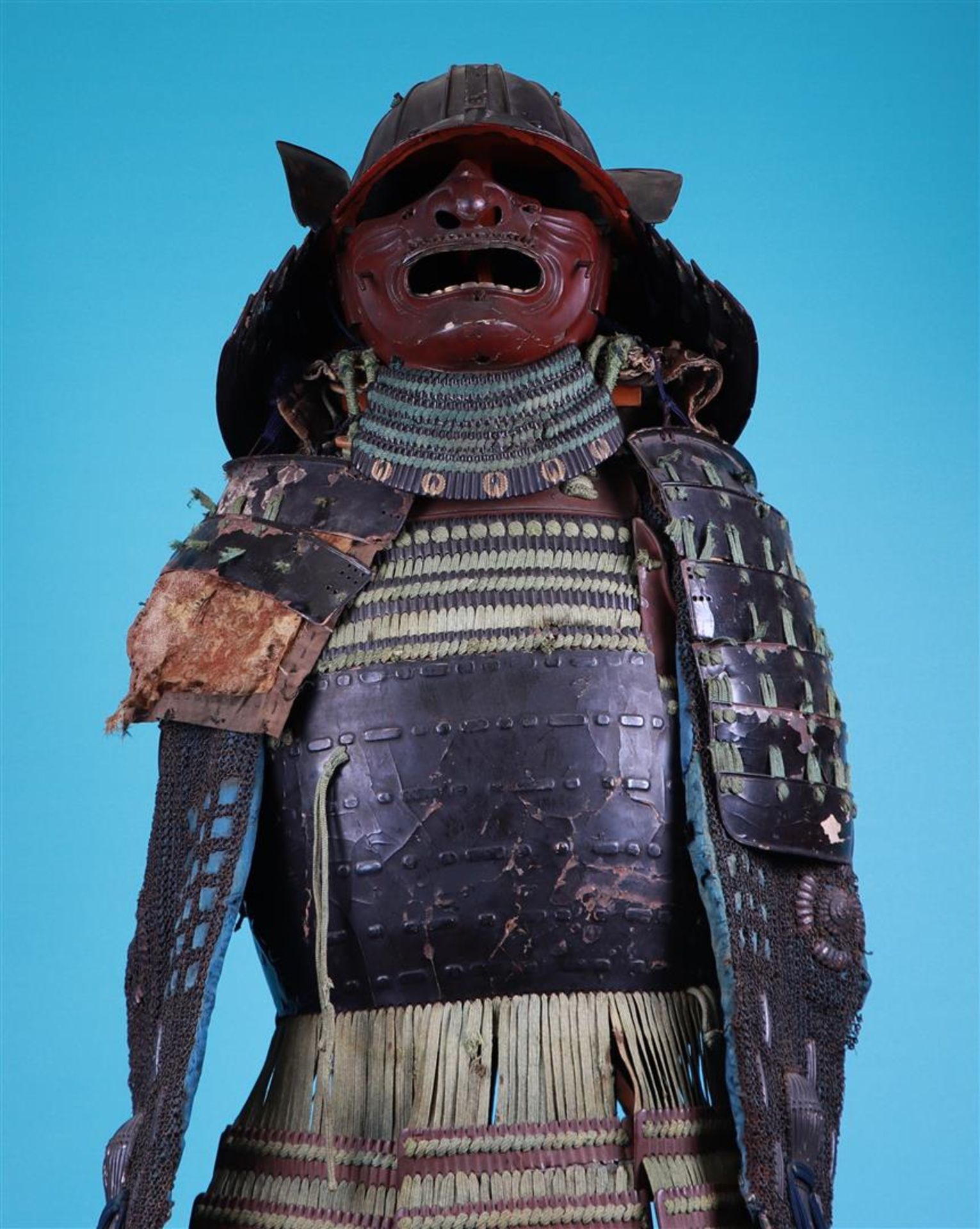 An antique Edo period, black lacquered Japanese armor (yoroi) laced with navy blue and green cords a - Image 8 of 8