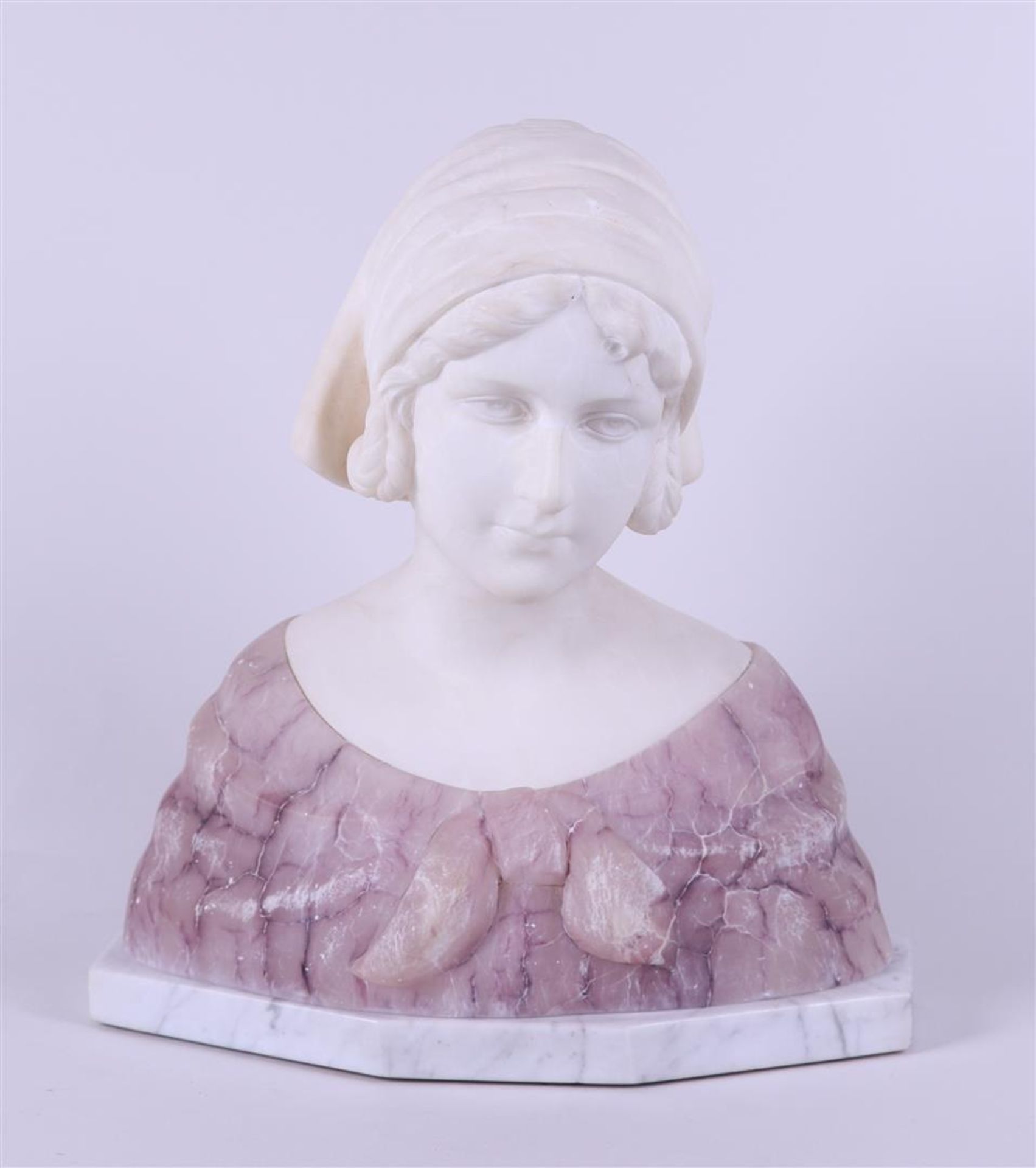 A bust of an Italian beauty made of two types of marble