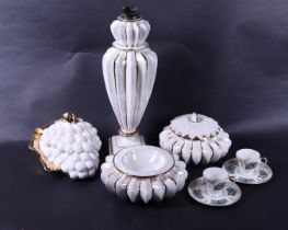 A lot with various porcelain including cups and saucers and a vase.