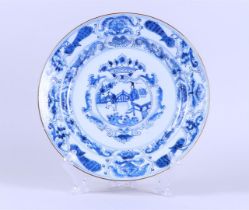 A porcelain dish with a decor of figures in the center and peacocks in the outer ring. China, Yongzh