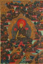 A framed thangka depicting scenes from the life of Buddha. Tibet, 20th century.