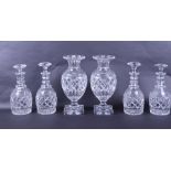 Lot of 4 Cut Crystal Decanters with Stoppers and a Pair of Baluster Vases