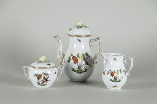 A porcelain coffee pot and cream set with Rothschild decor. 