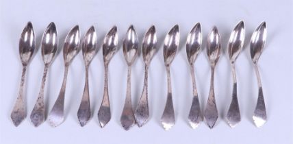 A set of 12 silver ice cream spoons, various hallmarks, including W and N