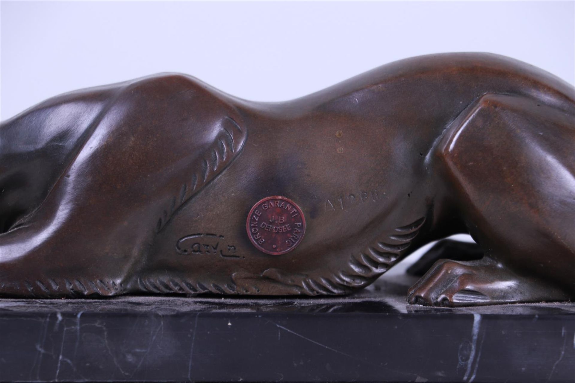 An Art Deco-style sculpture of a greyhound dog on a marble base.
 - Image 3 of 3