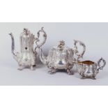 A silver 3-piece coffee/tea set in rich Rococo style; coffee pot, teapot and milk jug
