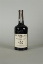 A bottle of Ferreira Vintage Port, 1985.