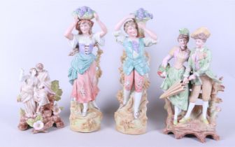 A lot of four biscuit statues