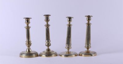 A lot of (4) early 19th century candlesticks (Empire). 