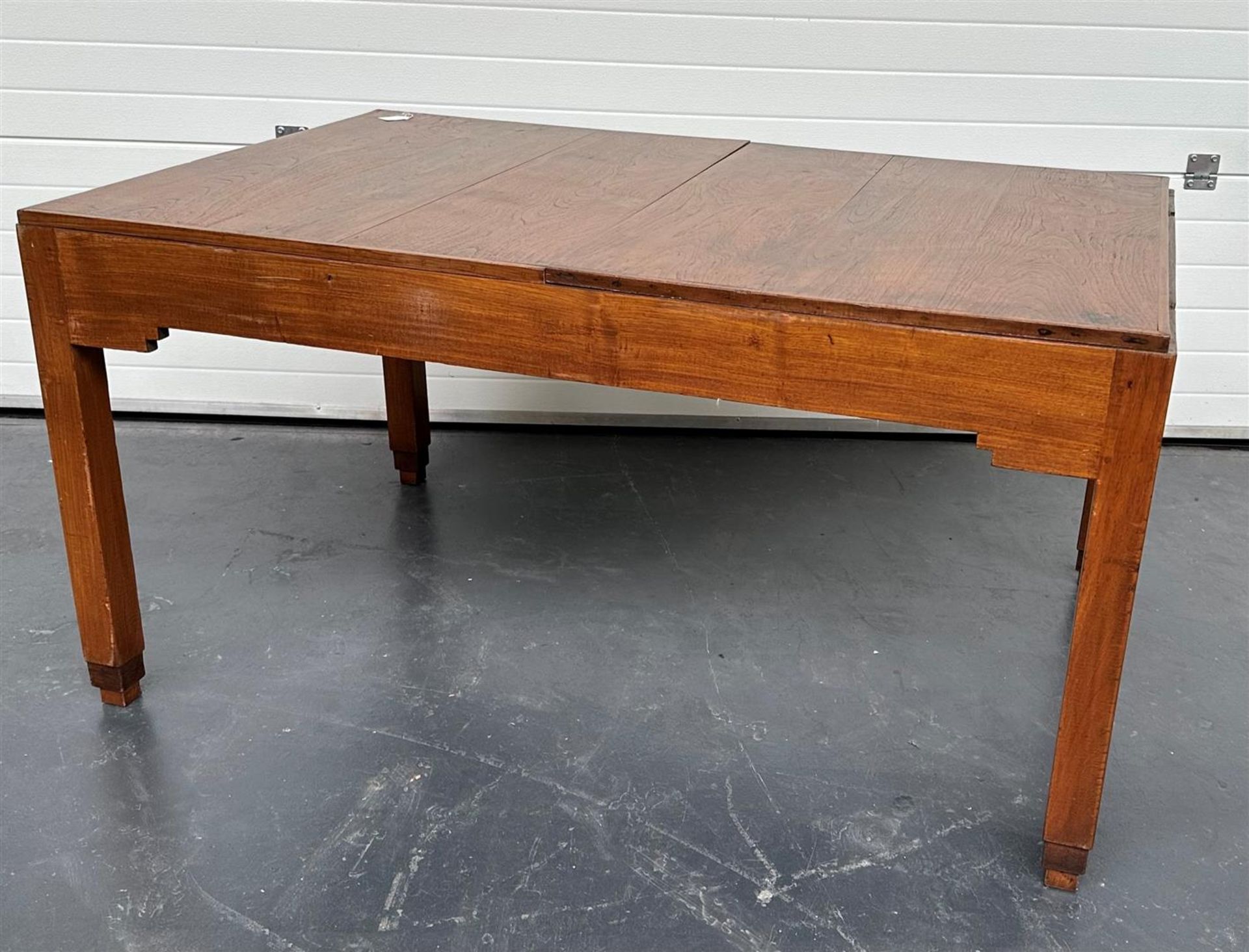 An oak 'Amsterdam School' dining table with extra top. ca. 1930.
