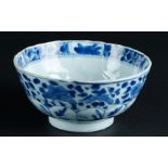 A porcelain bowl with bedding decor with rabbit and floral decor. Marked with artemisia leaf. China,