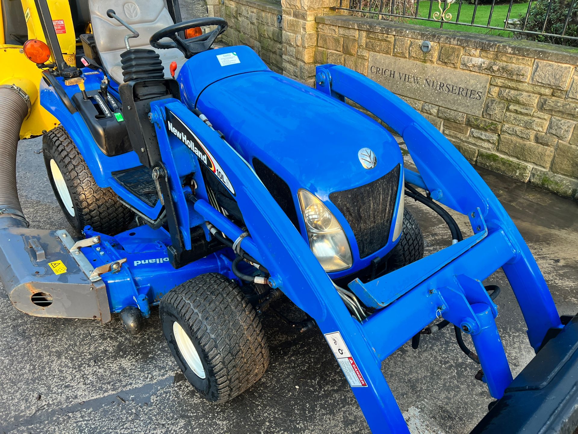 TZ25DA 25HP 4WD Compact Tractor With 54” Underslung Deck, Front Loader And Matev Rear Collector - Image 4 of 34