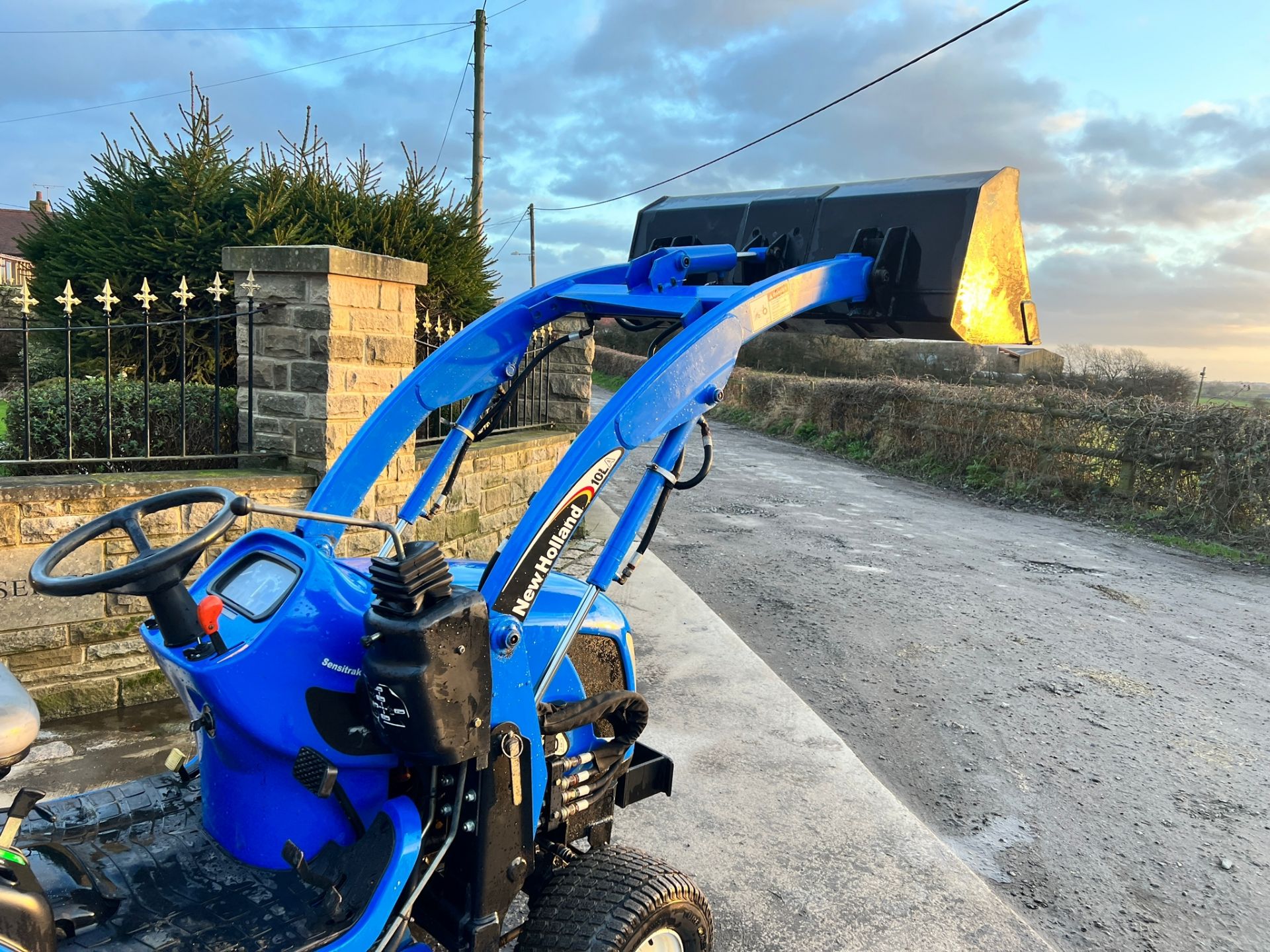 TZ25DA 25HP 4WD Compact Tractor With 54” Underslung Deck, Front Loader And Matev Rear Collector - Image 7 of 34