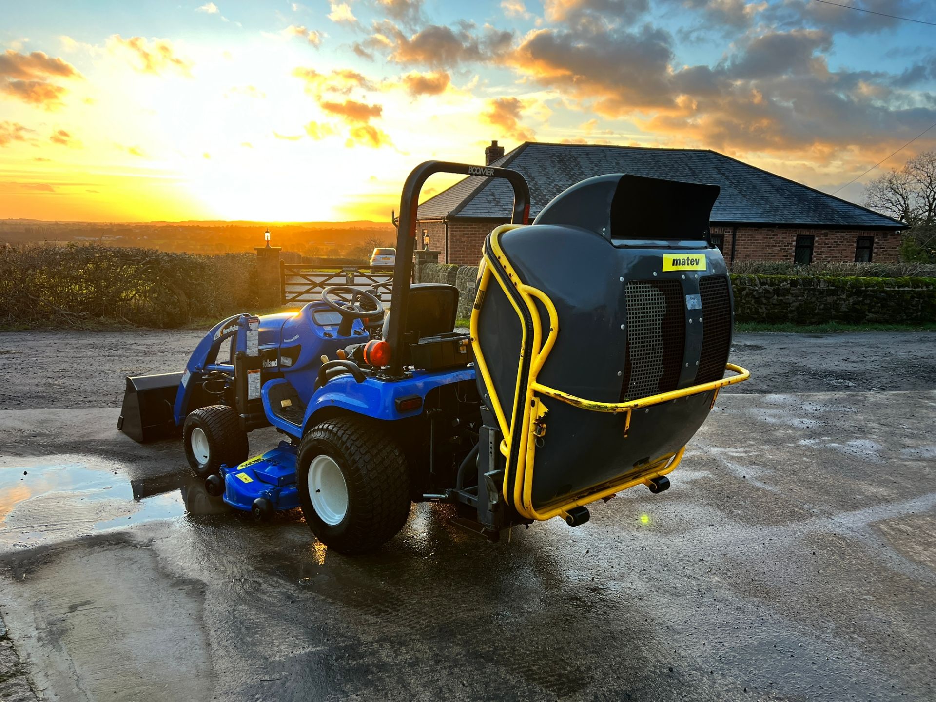 TZ25DA 25HP 4WD Compact Tractor With 54” Underslung Deck, Front Loader And Matev Rear Collector - Image 27 of 34