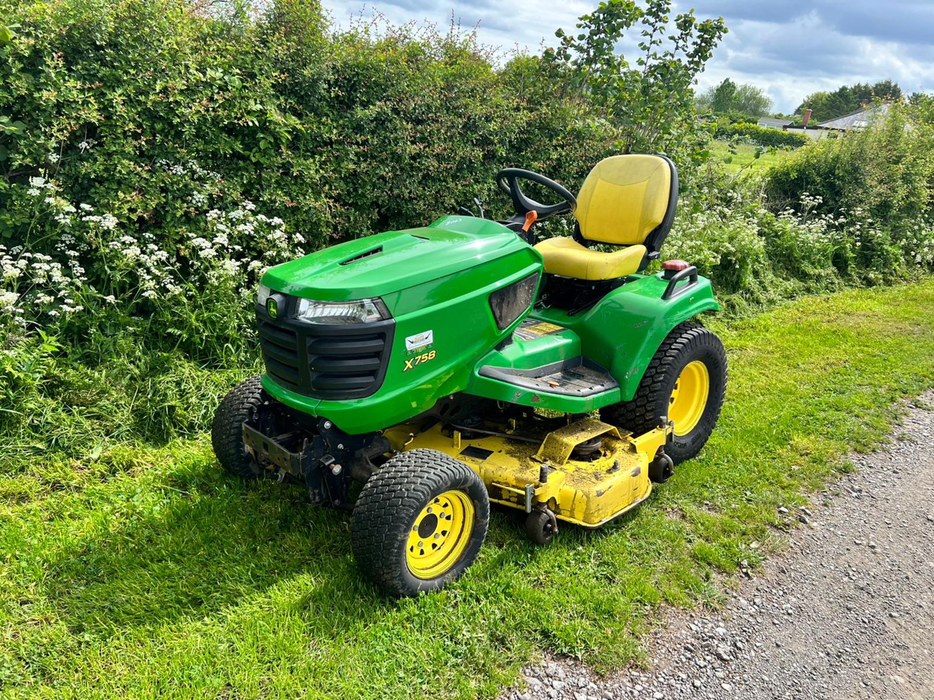 2013 John Deere X758 24HP 4WD Ride On Mower, Runs Drives And Cuts, Showing A Low 950 Hours!