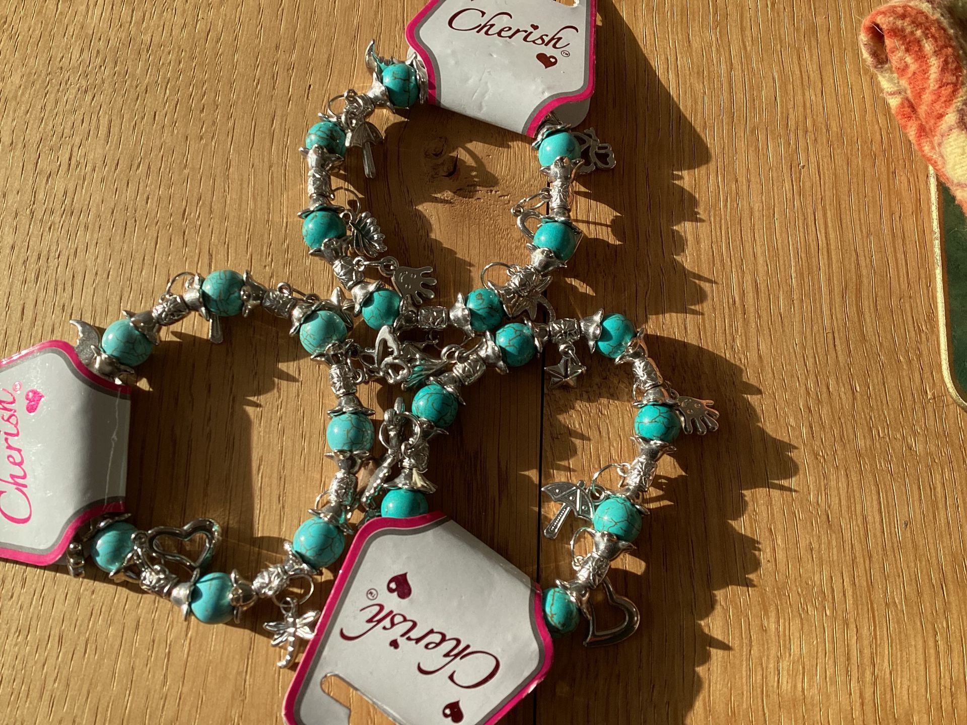 224 Aqua coloured Pandora styled Bracelets by Cherish with assortment of charms *NO VAT* - Image 3 of 3