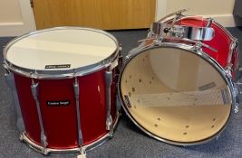 Matching red marching snare and tenor drum. Both 14 x 12", 6 ply birth shells