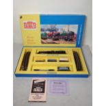 A Hornby Dublo 2024 2-8-0 Express Goods Set. Contents in mint-near mint condition. Loco and wagons