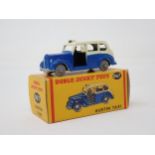 A boxed Dublo Dinky Toys No.067 Austin Taxi. Mint condition, superb box, small pencil price to one