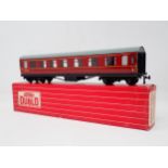 A Hornby-Dublo 4013 BR 1/2nd Class Corridor Coach. Unused and mint, metal coupling version, box Ex