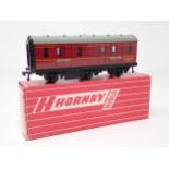 A Hornby Dublo 4076 Six-wheeled Brake Van in mint condition showing no signs of use to the wheels,