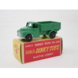 A rare boxed Dublo Dinky Toys No.064 black wheel Austin Lorry. Mint condition in superb correct
