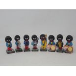 Eight pottery Robinson Jam Doll Figures