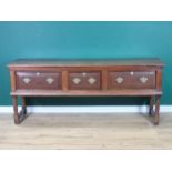 An 18th Century oak Dresser Base fitted three frieze drawers mounted on turned supports united by