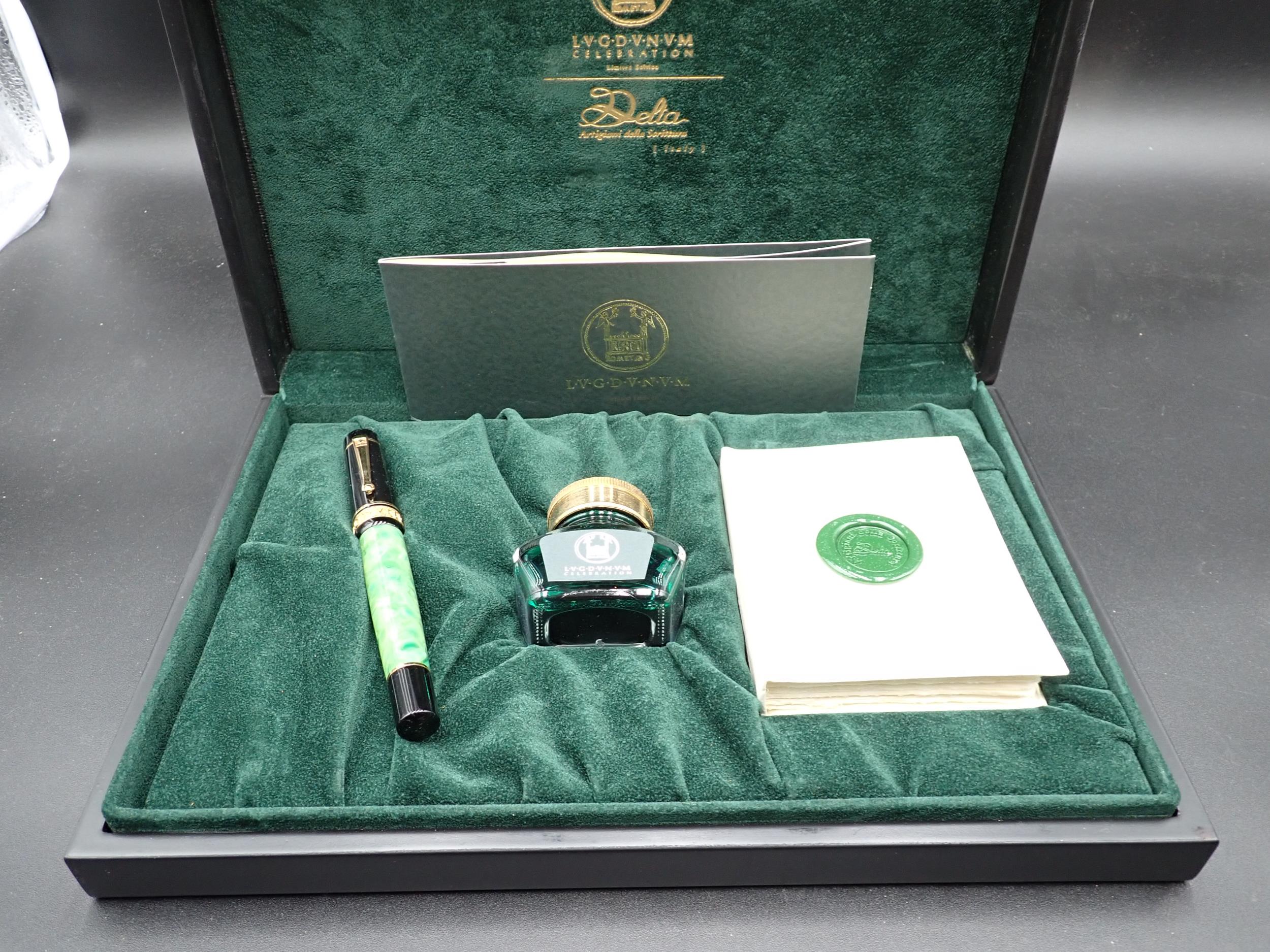 A Delta 'Lugdunum' Fountain Pen, 72/98, green marble case with black cap, 18k nib, in box