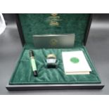 A Delta 'Lugdunum' Fountain Pen, 72/98, green marble case with black cap, 18k nib, in box